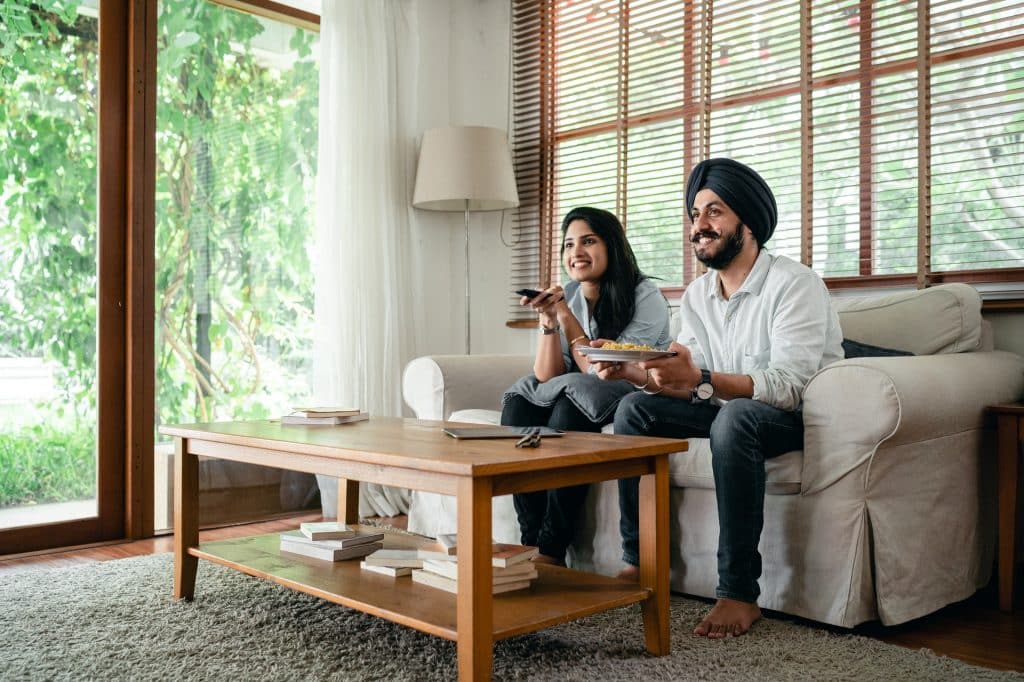 happy couple in clean toronto apartment
