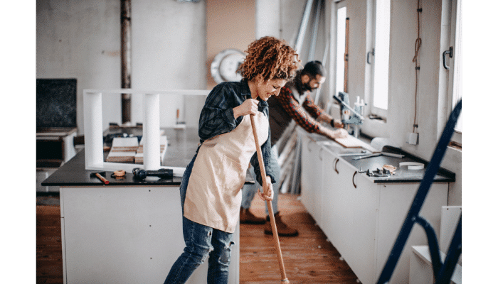 team of cleaners tidying a renovated house